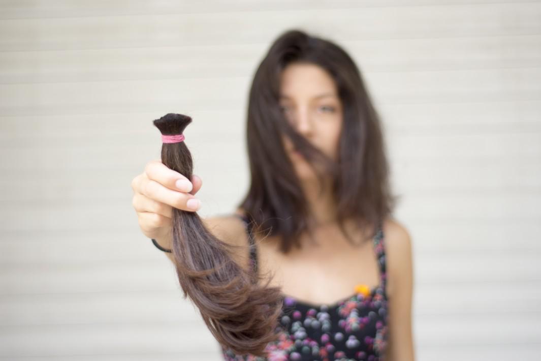 Young woman donating her hair